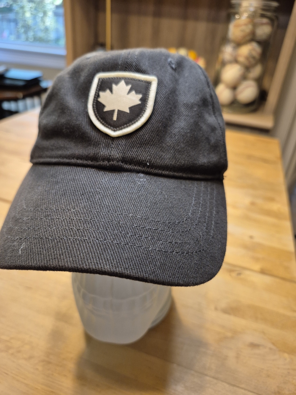 Men's Black Baseball Cap with Maple Shield Patch